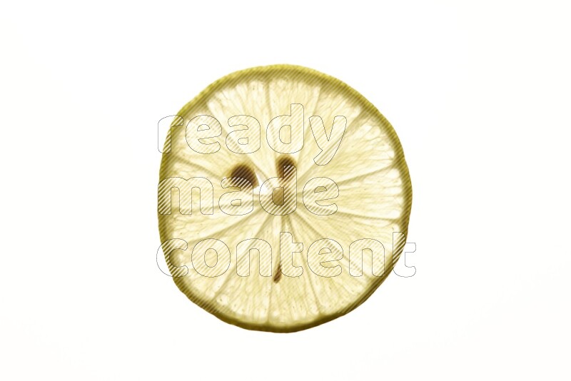 Lemon slices on illuminated white background