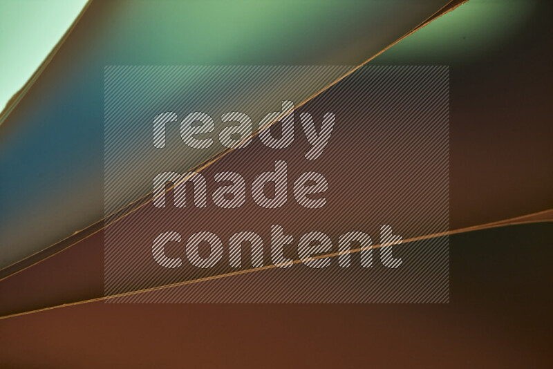 فن تجريدي يعرض منحنيات مع تدرجات الألوان الدافئة والباردة مكونه بضوء ملون