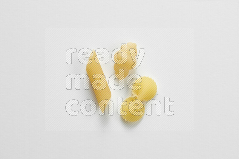Different pasta types on white background