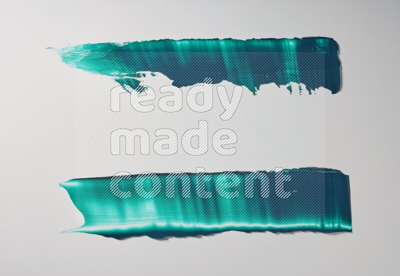 Turquoise painting knife strokes on white background