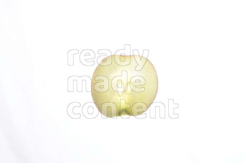 Apple slices on illuminated white background
