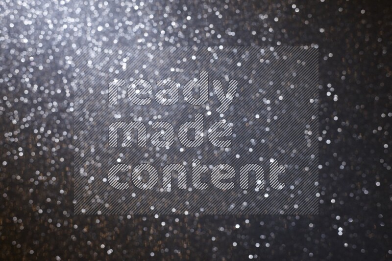 Black glittery bokeh background