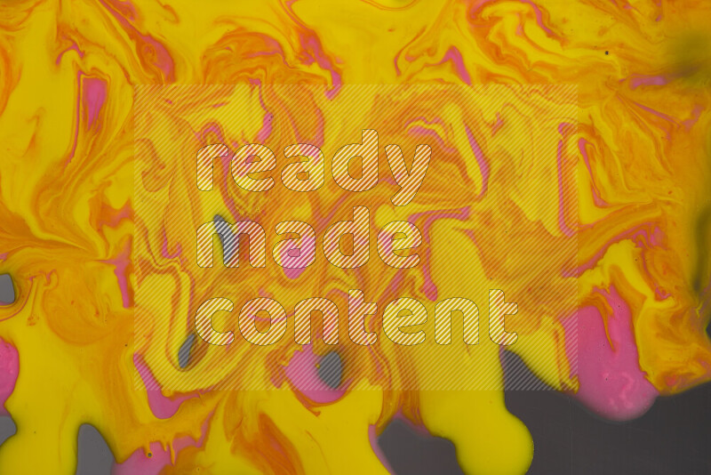 Abstract colorful background with mixed of pink and yellow paint colors