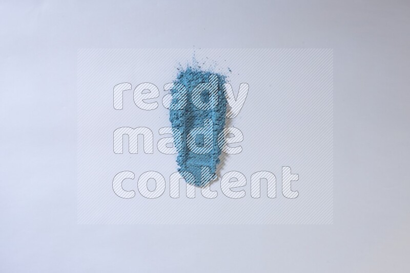 Blue powder smears on white background