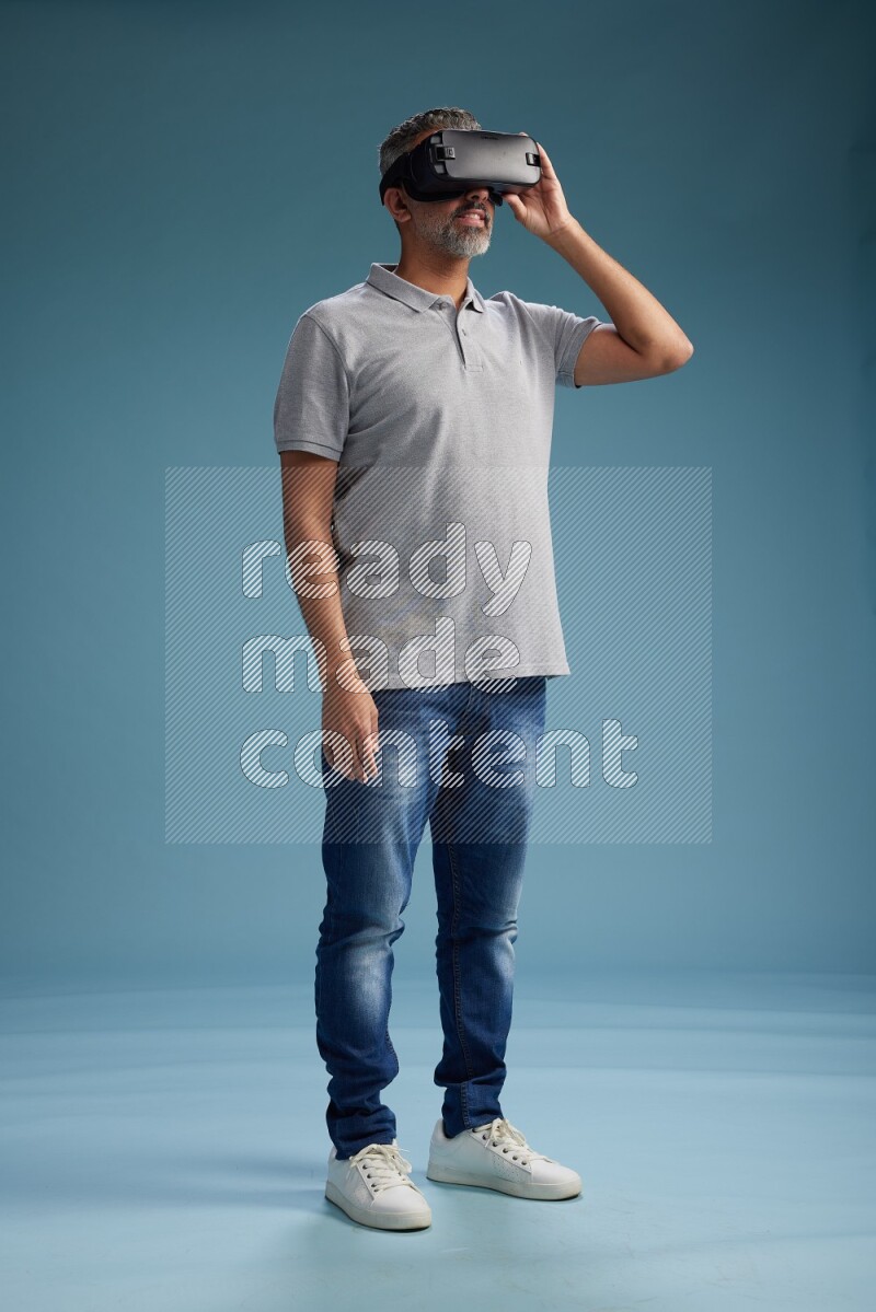 Man Standing Gaming with VR