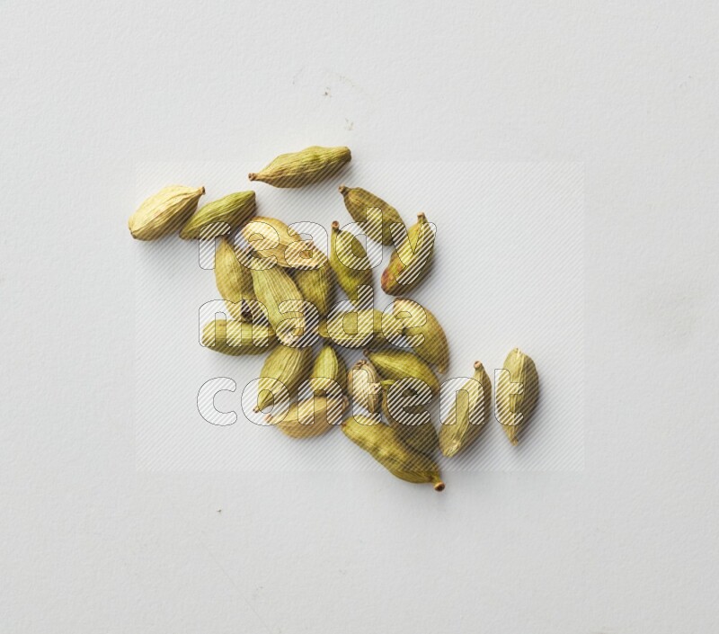 Top-view shot of Cardamon on white background