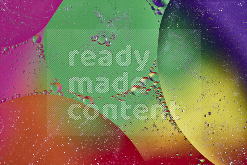 Close-ups of abstract oil bubbles on water surface in multicolors