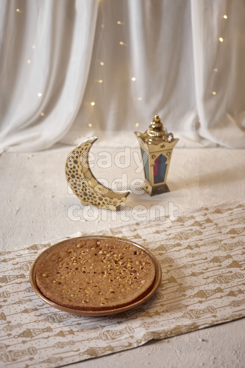 Basbousa with lanterns in a light setup