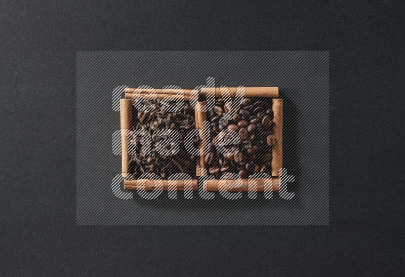 2 squares of cinnamon sticks full of coffee beans and cloves on black flooring