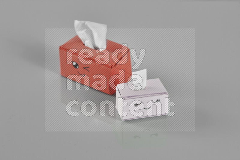 Origami tissue box on grey background