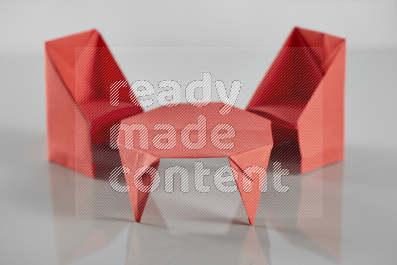 Origami dinning room on grey background