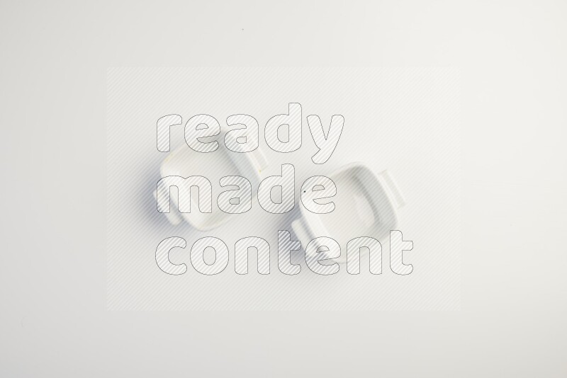 white ceramic square sauce dish on white countertop