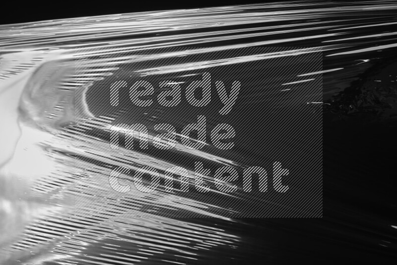 Plastic wrap texture on black background