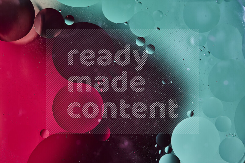 لقطات مقربة لفقاعات من الزيت على سطح الماء باللون الأخضر والأحمر