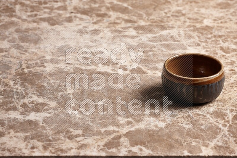 Multicolored Pottery Bowl on Beige Marble Flooring