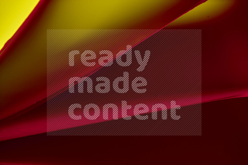 An abstract art piece displaying smooth curves in warm and cold gradients created by colored light