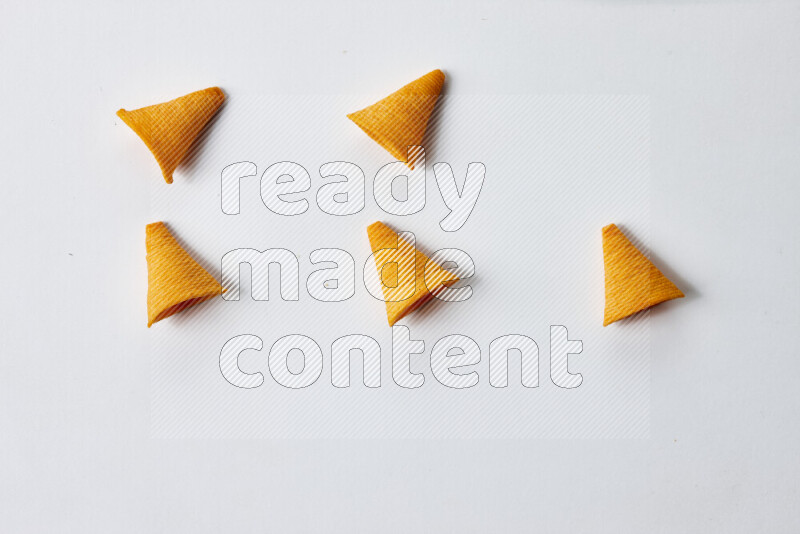 Assorted snacks on white background