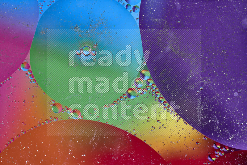 Close-ups of abstract oil bubbles on water surface in multicolors