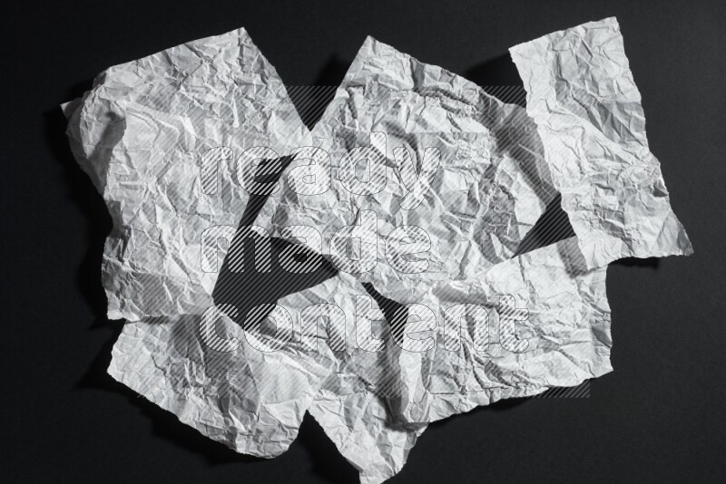 White paper sheet on black background