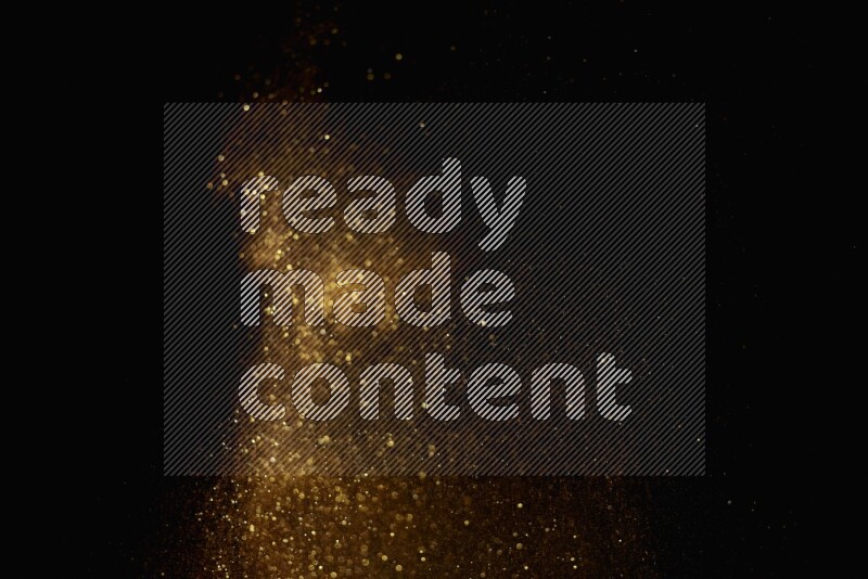 Gold glitter powder isolated on black background
