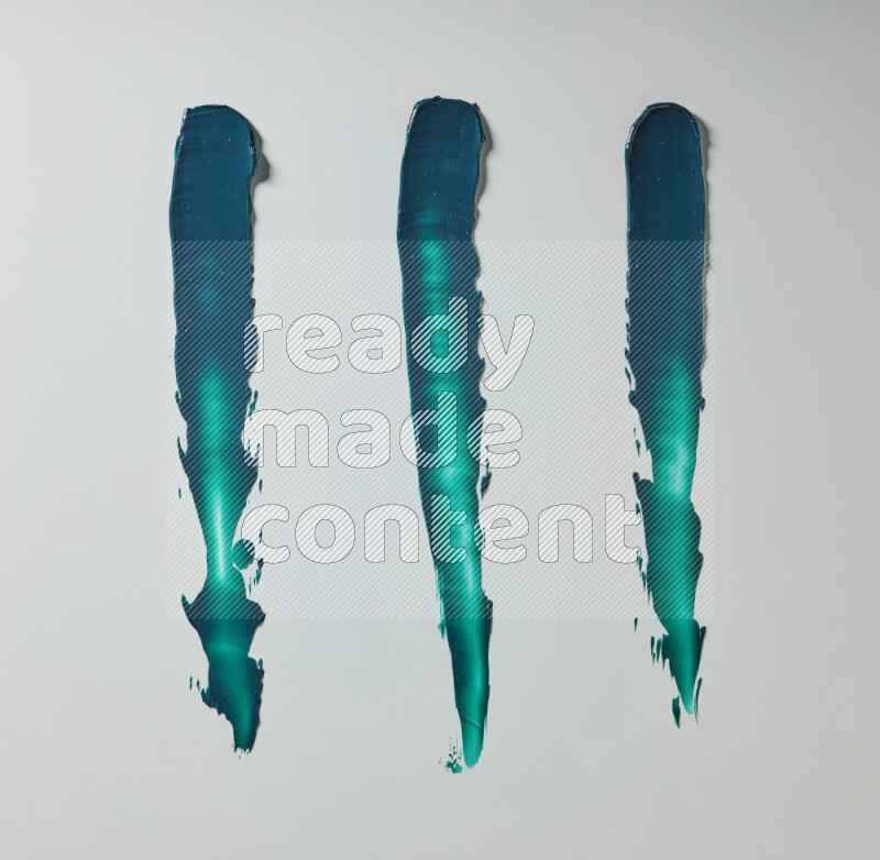 Turquoise painting knife strokes on white background