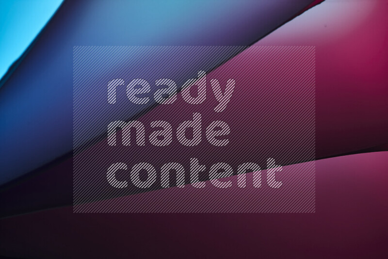 An abstract art piece displaying smooth curves in warm and cold gradients created by colored light