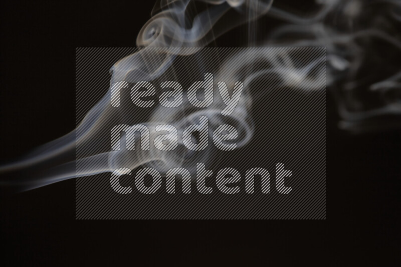 Motion of wavy smoke isolated on dark background