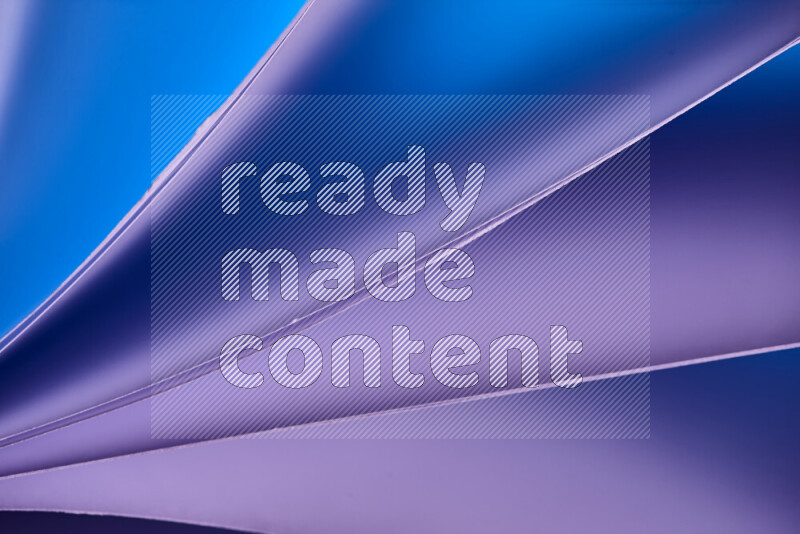 An abstract art piece displaying smooth curves in warm and cold gradients created by colored light