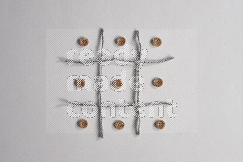 Brown buttons placed on grey background