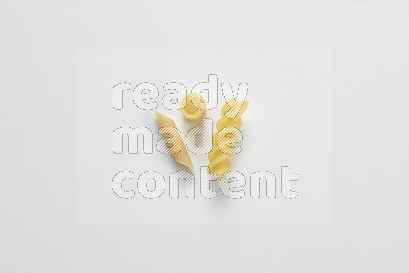 Different pasta types on white background