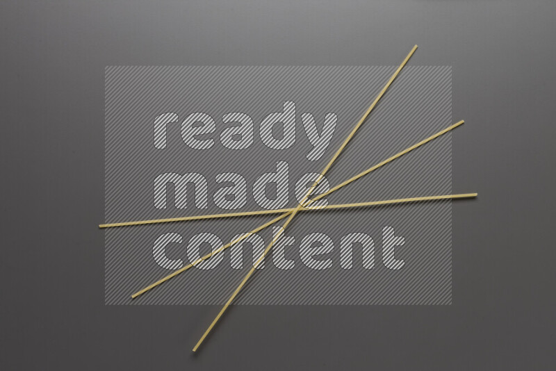 Spaghetti pasta on grey background