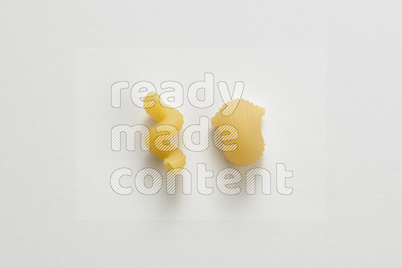 Different pasta types on white background