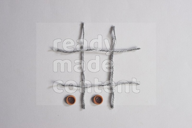 Wooden buttons placed on grey background