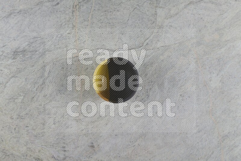 A multicolored pottery Bowl on grey marble background