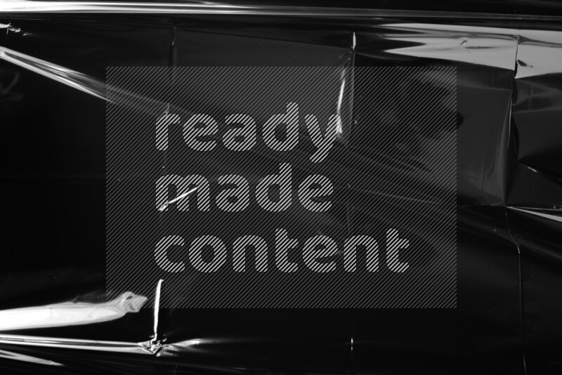 Plastic wrap texture on black background