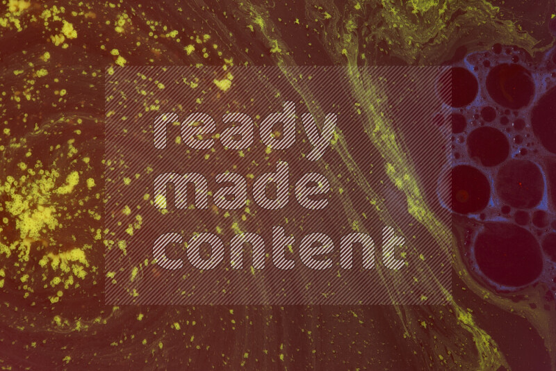 The image depicts a marbling effect with swirling patterns of red and yellow