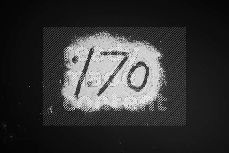 Percentages written with powder on black background