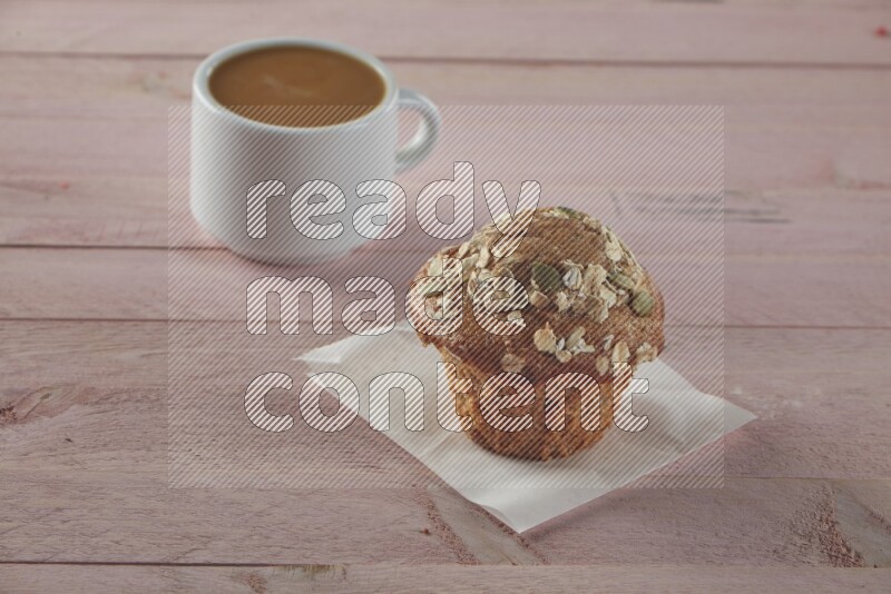 Multigrain cupcake on a wooden pink background