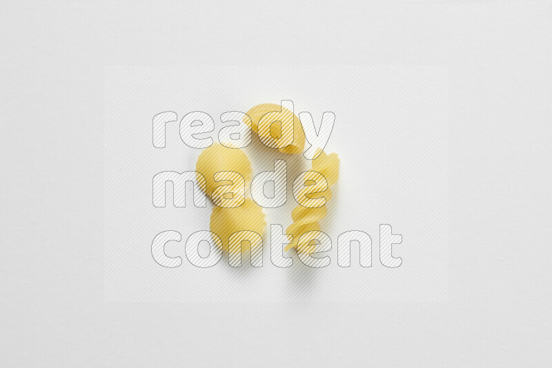 Different pasta types on white background