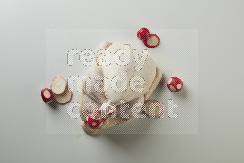 Whole fresh chicken direct on a white background