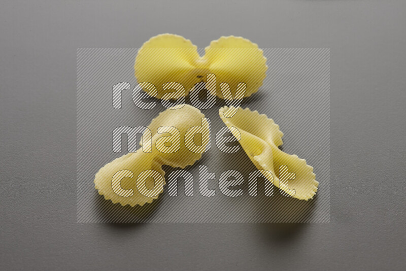 Fiocchi pasta on grey background