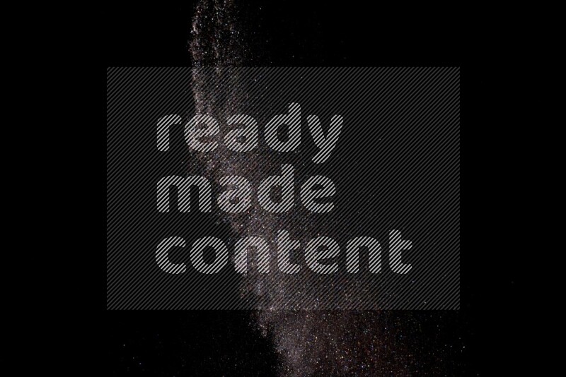 Multicolored glitter powder isolated on black background