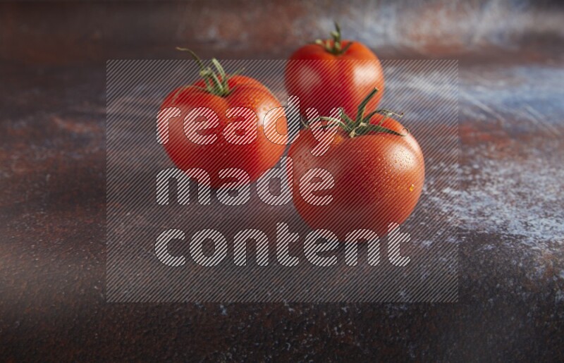 45 degree roma tomato on a textured reddish rustic metal background