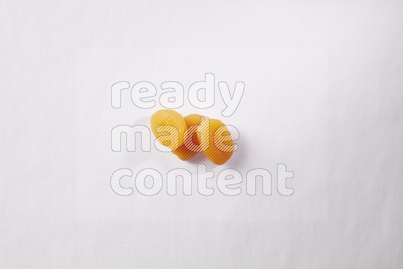 Dried apricots on white background