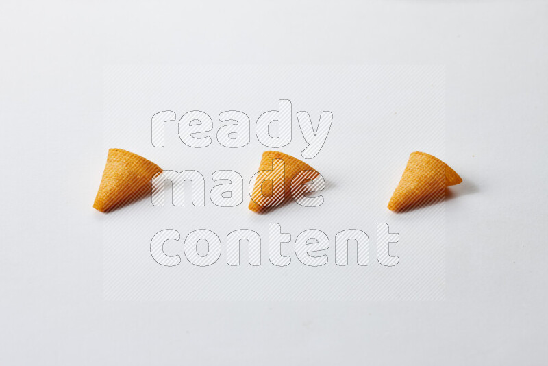 Assorted snacks on white background