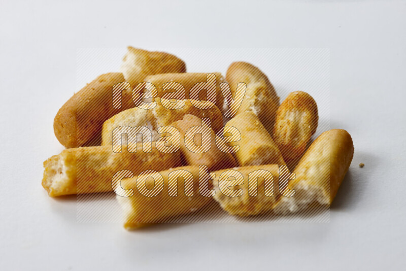 Assorted snacks on white background