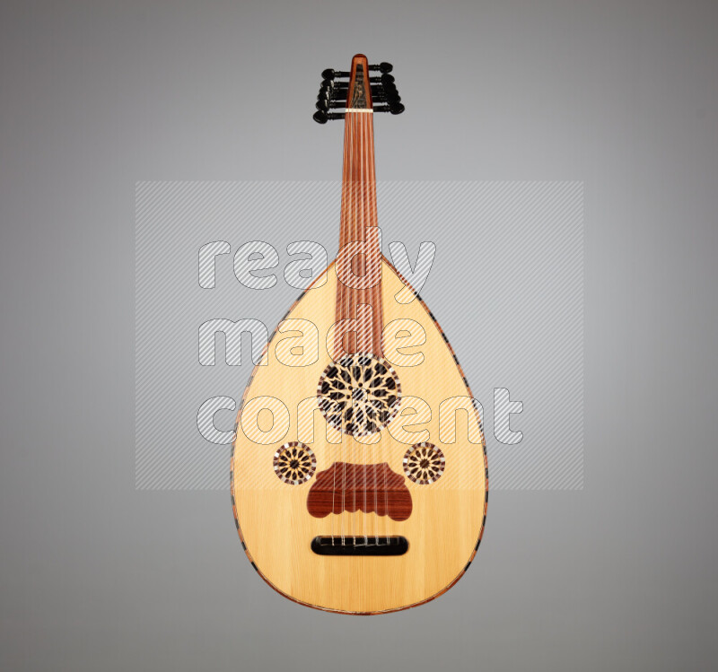 a wooden brown Oud on a gray background