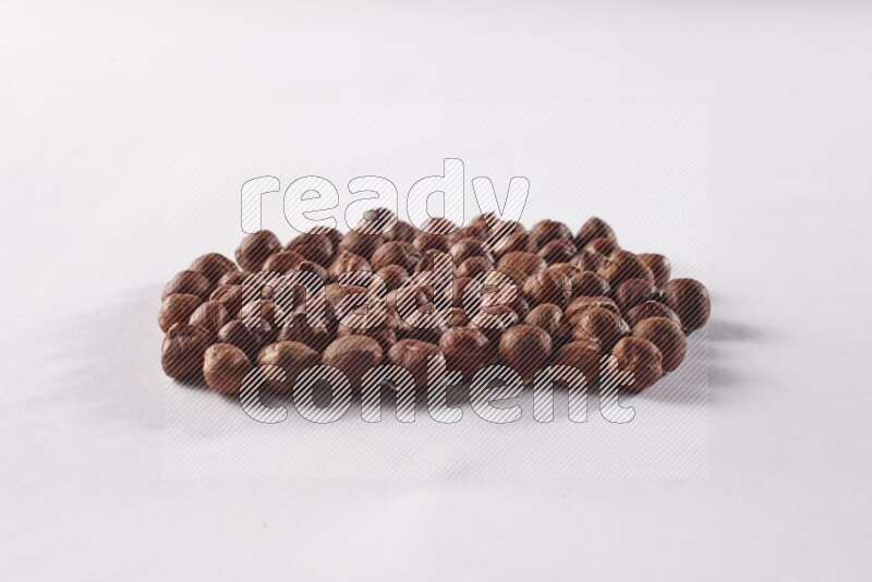 Hazelnuts on white background