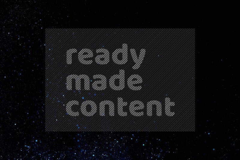 Blue glitter powder isolated on black background