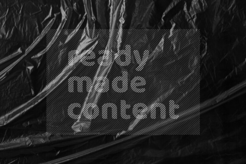 Plastic surface texture on dark background